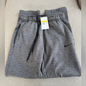 Nike Men’s Therma-FIT training sweatpants NWT, size S, color heathered gray.
